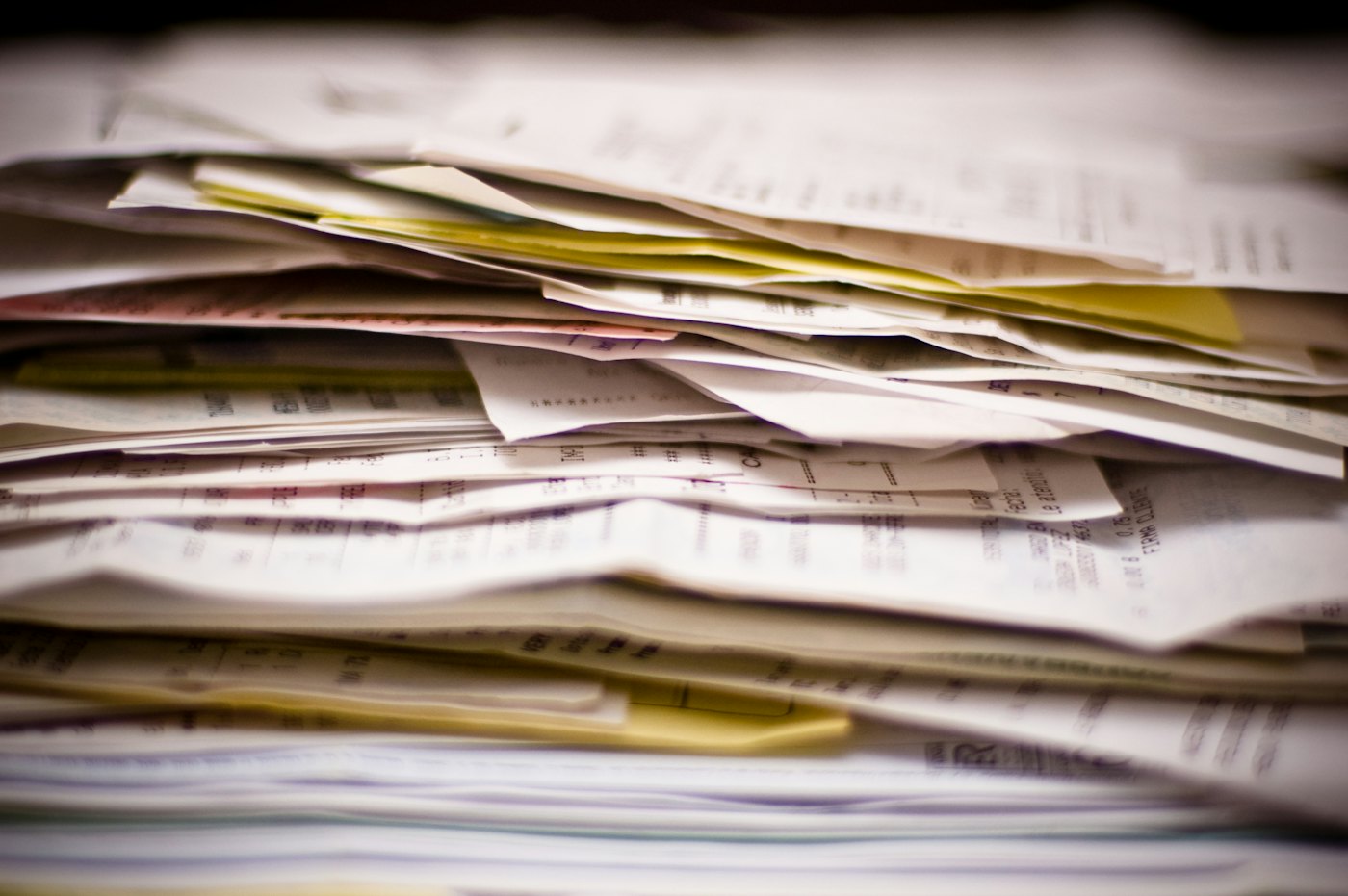 A tall stack of paperwork